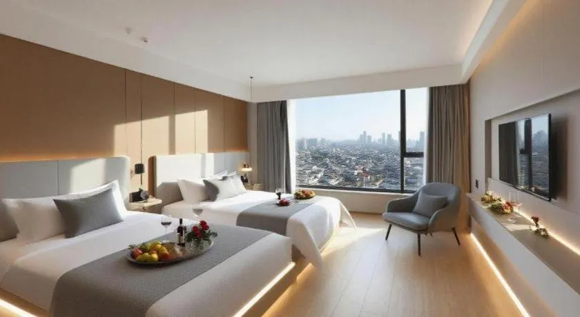 Bed in Magnotel Hotel Huizhou South Station Branch