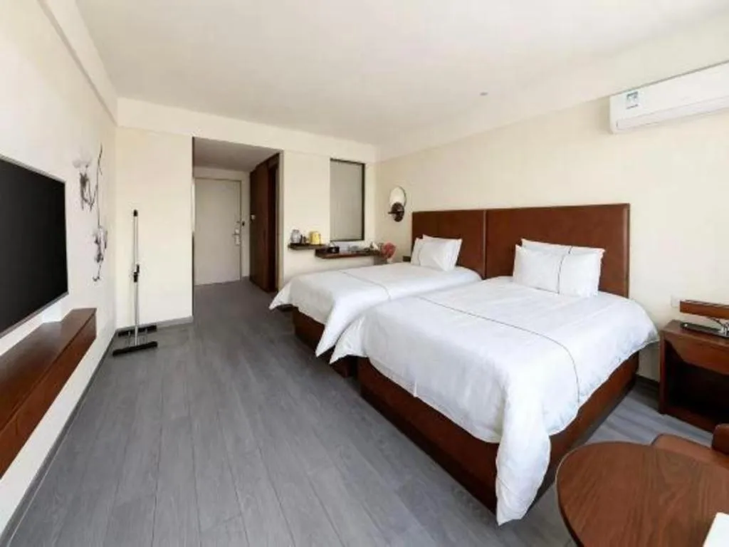 Bed in Magnotel Hotel Huizhou South Station Branch