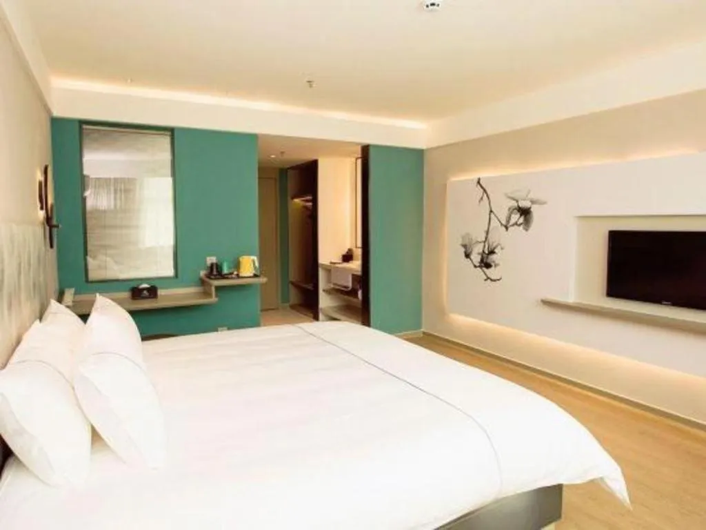 Bed in Magnotel Hotel Huizhou South Station Branch