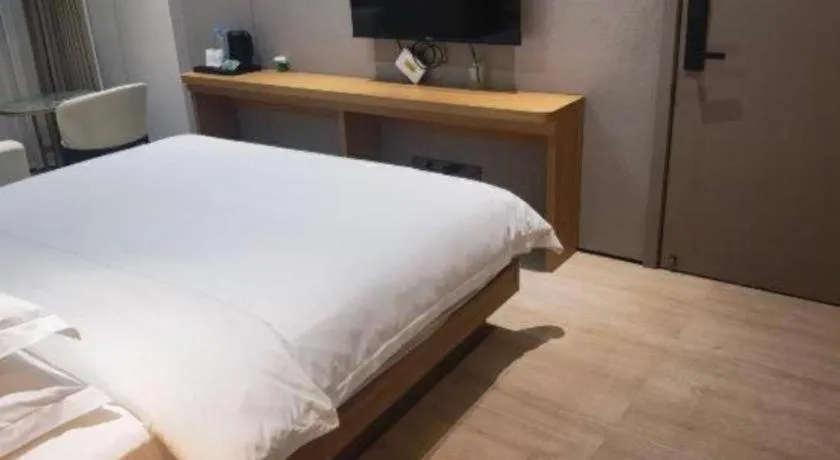 Bed in Magnotel Hotel Huizhou South Station Branch