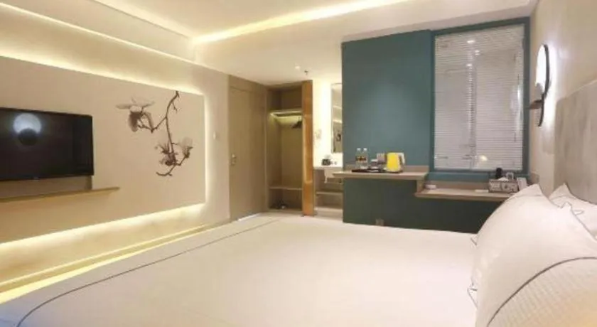 Bed in Magnotel Hotel Huizhou South Station Branch