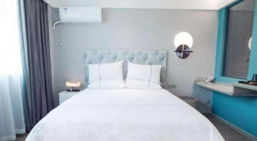 Bed in Magnotel Hotel Huizhou South Station Branch