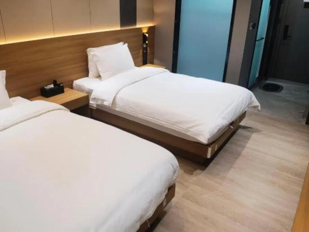 Bed in Magnotel Hotel Huizhou South Station Branch