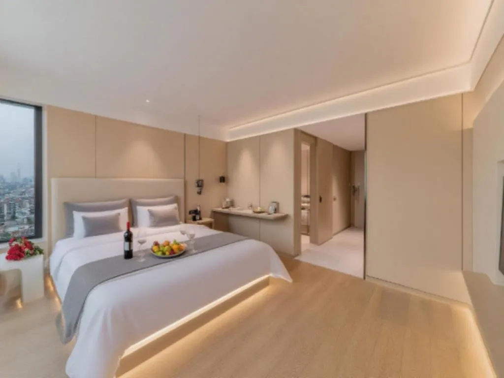 Bed in Magnotel Hotel Huizhou South Station Branch