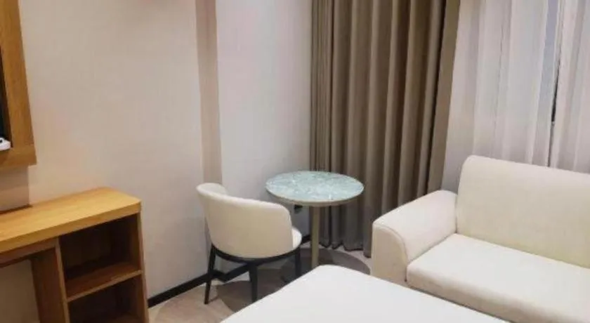 Bed in Magnotel Hotel Huizhou South Station Branch