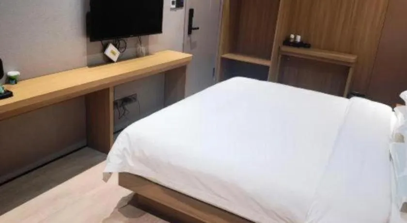 Bed in Magnotel Hotel Huizhou South Station Branch