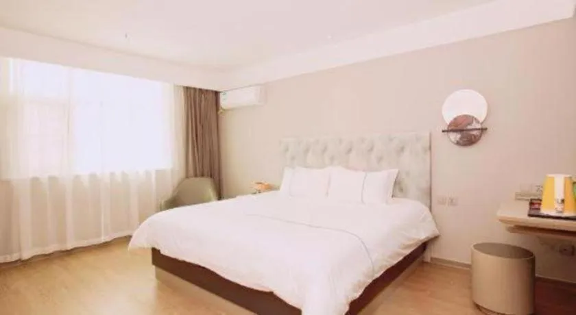 Bed in Magnotel Hotel Huizhou South Station Branch