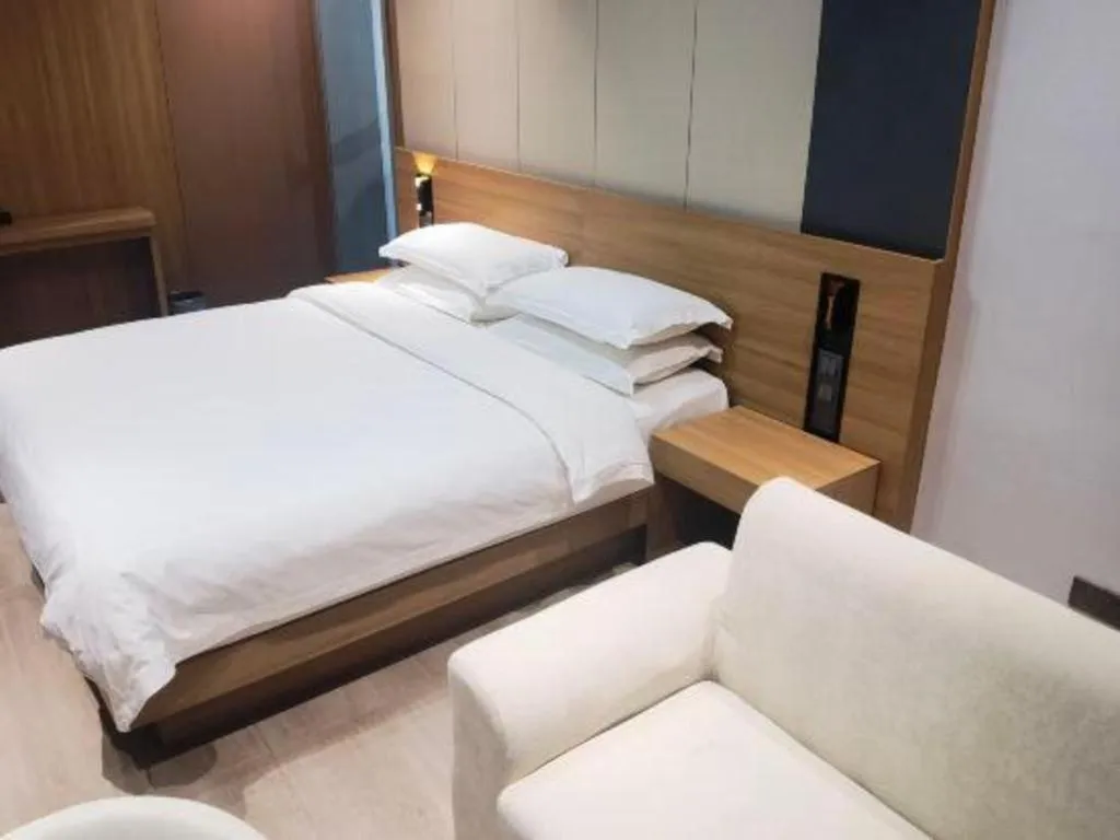 Bed in Magnotel Hotel Huizhou South Station Branch