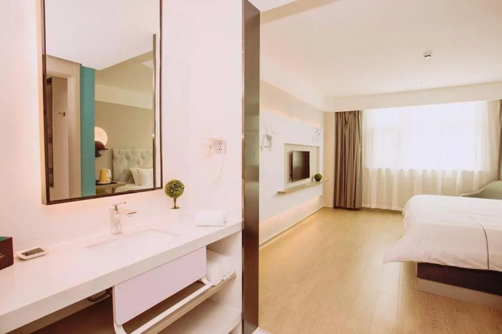 Bed in Magnotel Hotel Huizhou South Station Branch