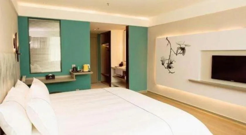 Bed in Magnotel Hotel Huizhou South Station Branch