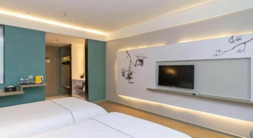 Bed in Magnotel Hotel Huizhou South Station Branch