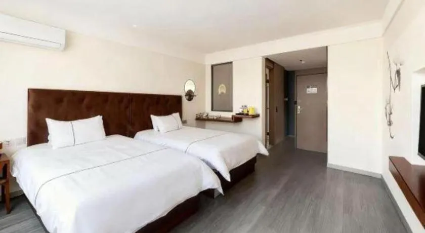 Bed in Magnotel Hotel Huizhou South Station Branch