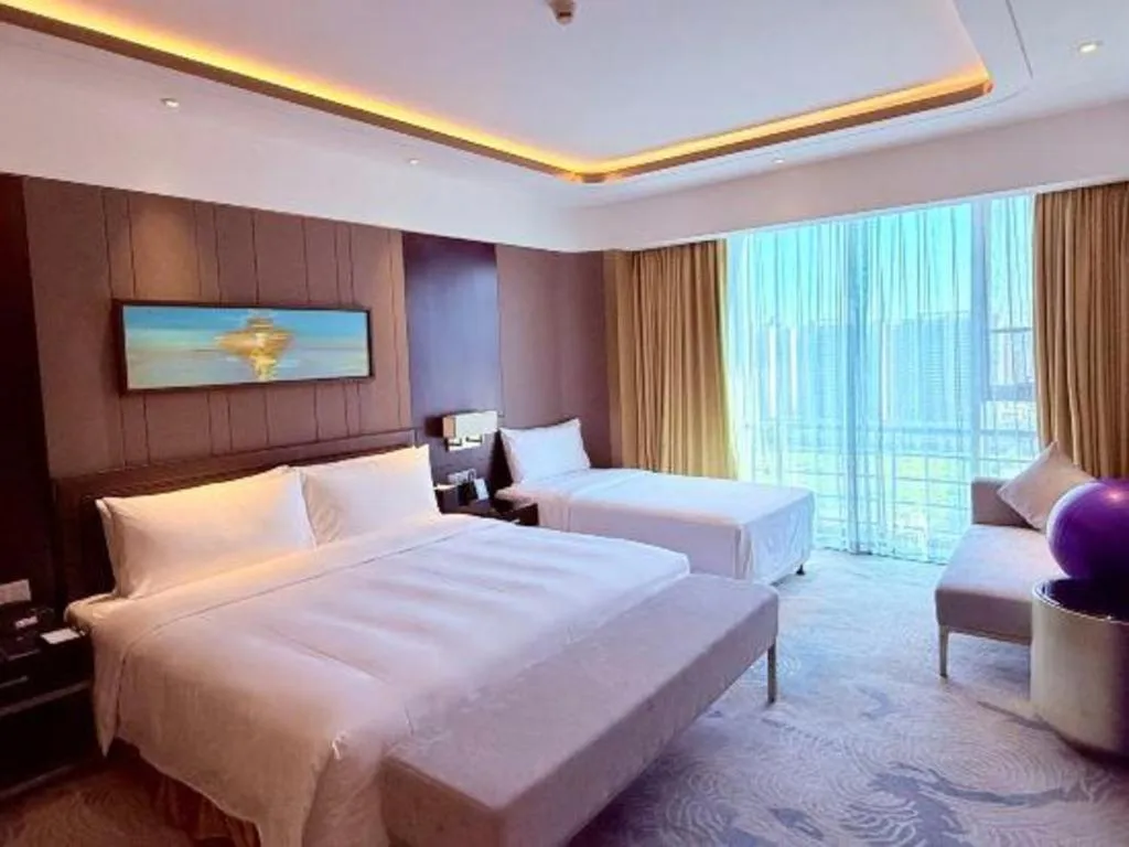 Bed in The QUBE Hotel Jingzhou