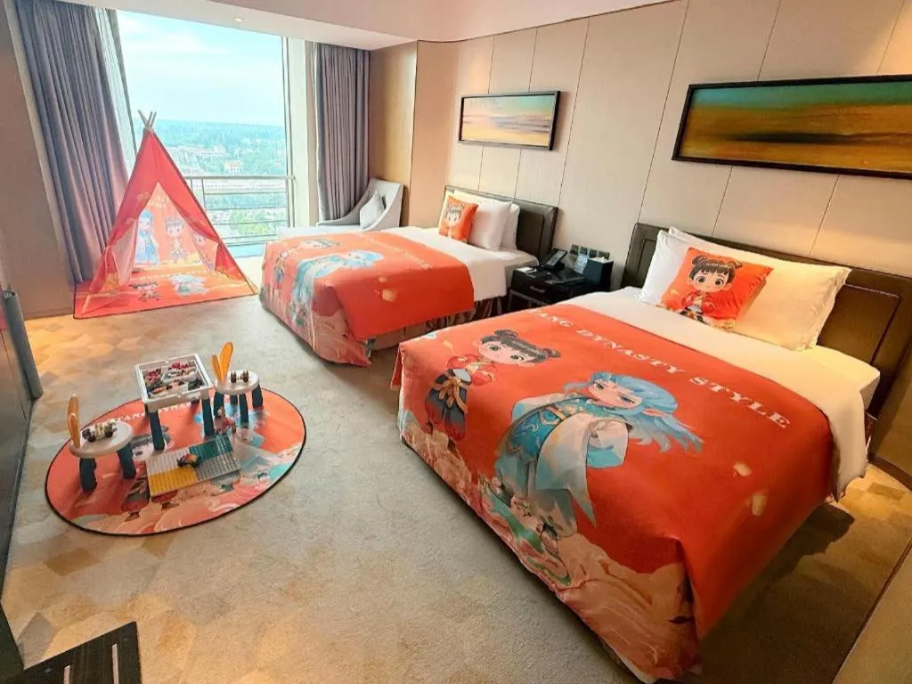 Bed in The QUBE Hotel Jingzhou