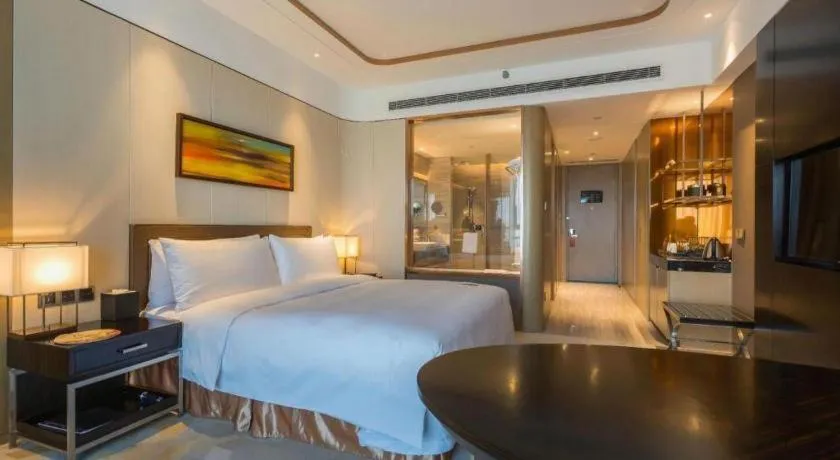Bed in The QUBE Hotel Jingzhou