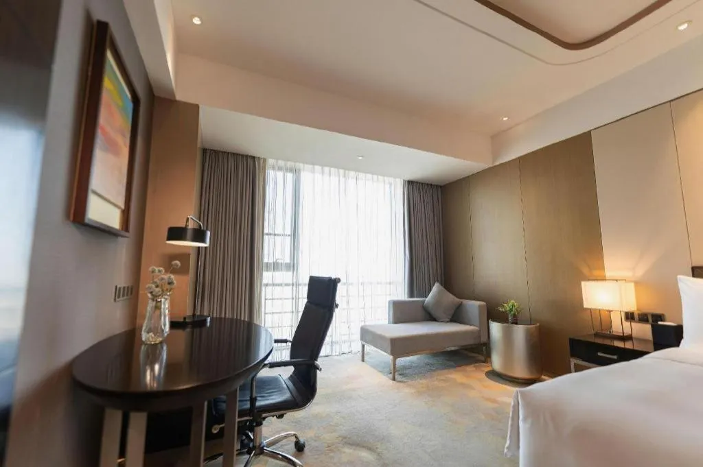 Bed in The QUBE Hotel Jingzhou