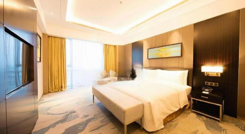 Bed in The QUBE Hotel Jingzhou