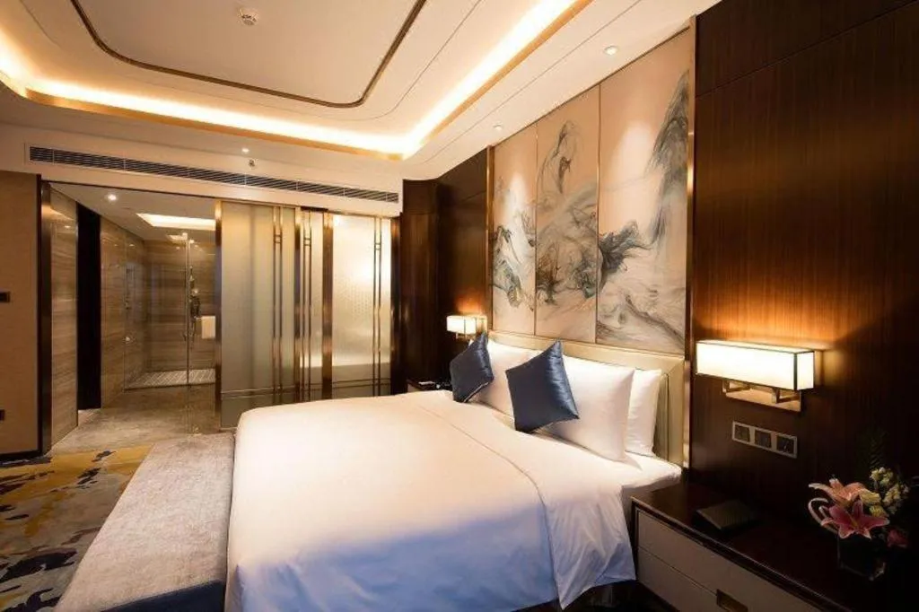 Bed in The QUBE Hotel Jingzhou