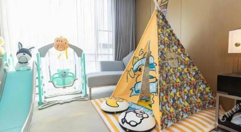 Bed in The QUBE Hotel Jingzhou