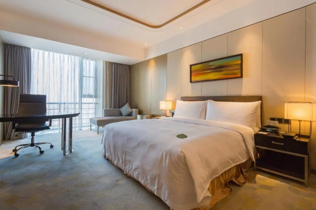 Bed in The QUBE Hotel Jingzhou