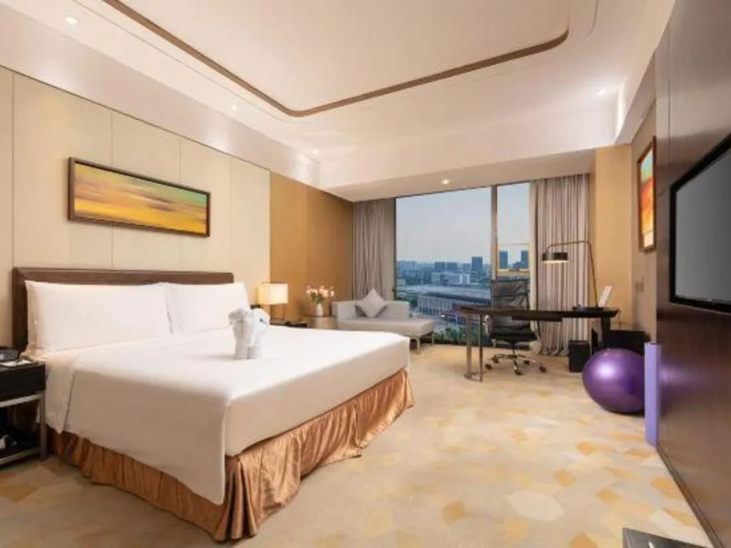 Bed in The QUBE Hotel Jingzhou