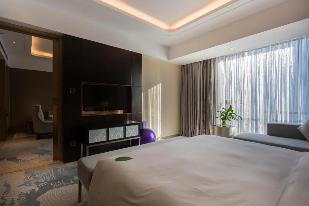 Bed in The QUBE Hotel Jingzhou