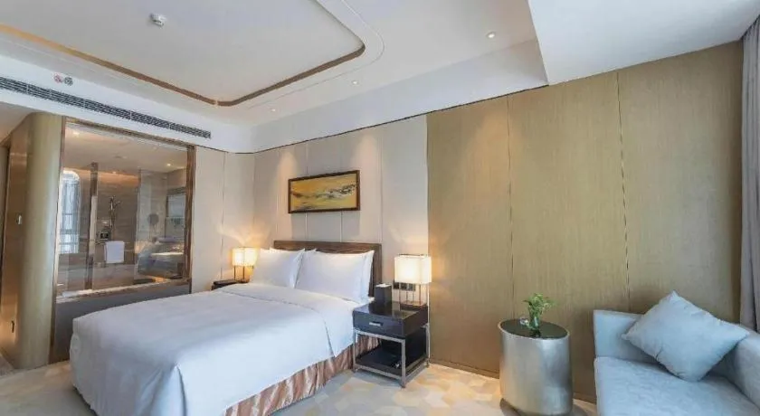 Bed in The QUBE Hotel Jingzhou