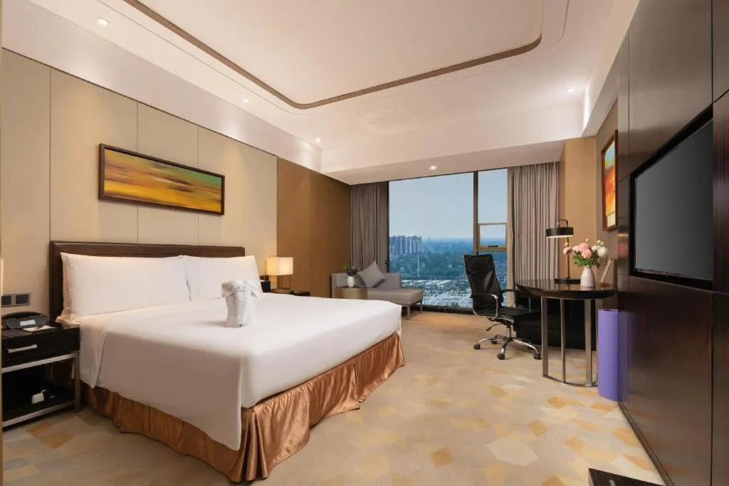 Bed in The QUBE Hotel Jingzhou