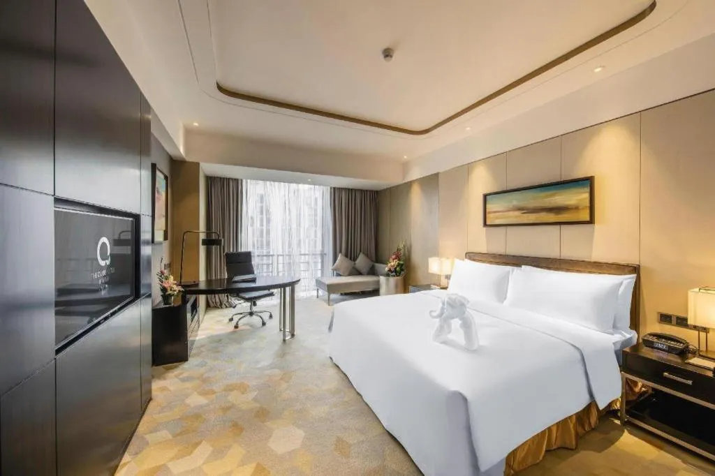 Bed in The QUBE Hotel Jingzhou