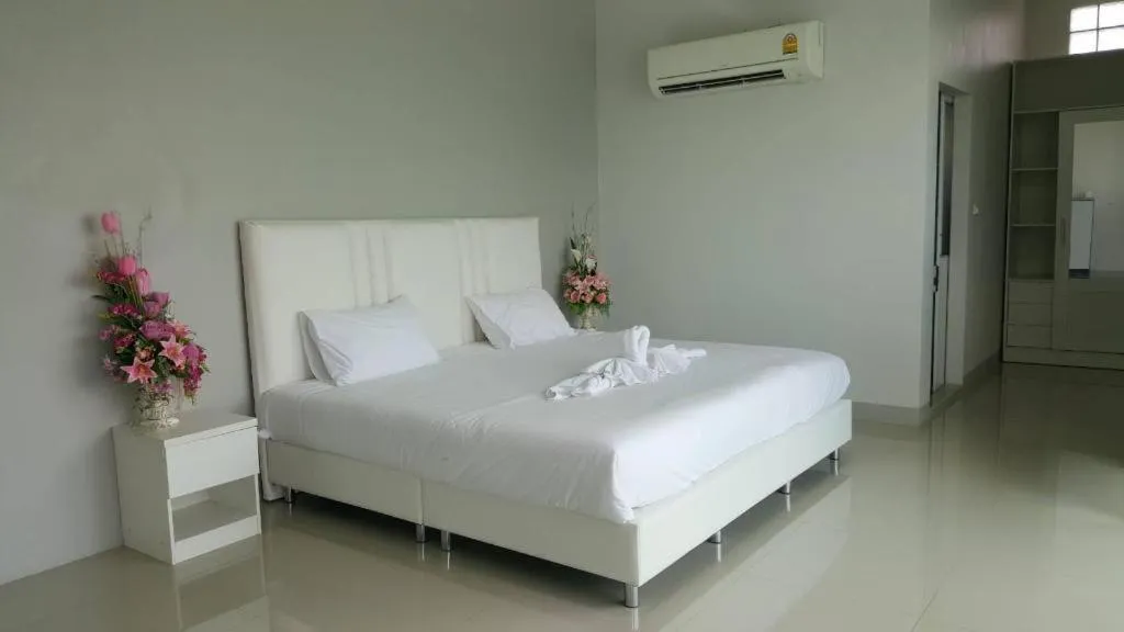 Bed in River Residence Saraburi Hotel