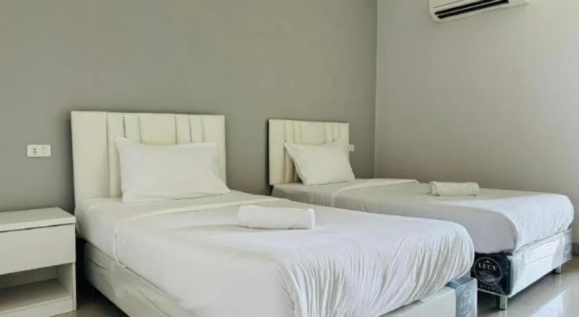 Bed in River Residence Saraburi Hotel