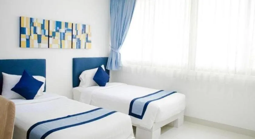 Bed in Sansuri Resort