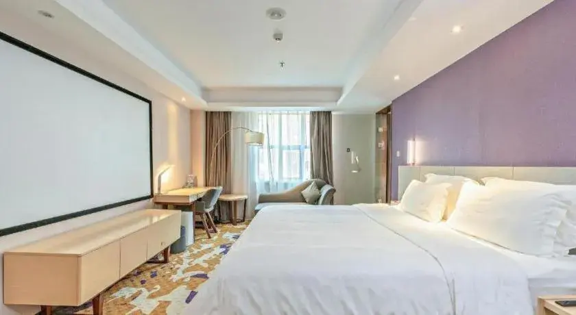 Bed in Lavande Hotels Guangzhou Baiyun Avenue North Metro Station Bed in Lavande Hotels Guangzhou Baiyun Avenue North Metro Station