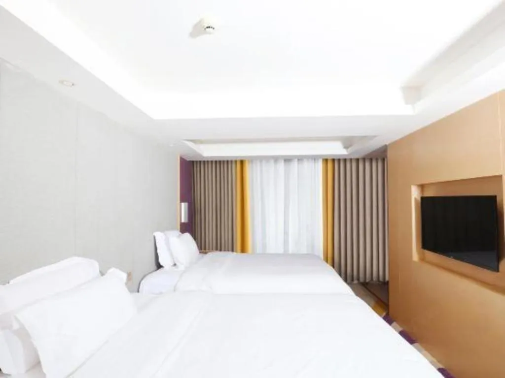 Bed in Lavande Hotels Guangzhou Baiyun Avenue North Metro Station