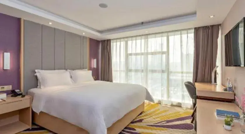 Bed in Lavande Hotels Guangzhou Baiyun Avenue North Metro Station Bed in Lavande Hotels Guangzhou Baiyun Avenue North Metro Station