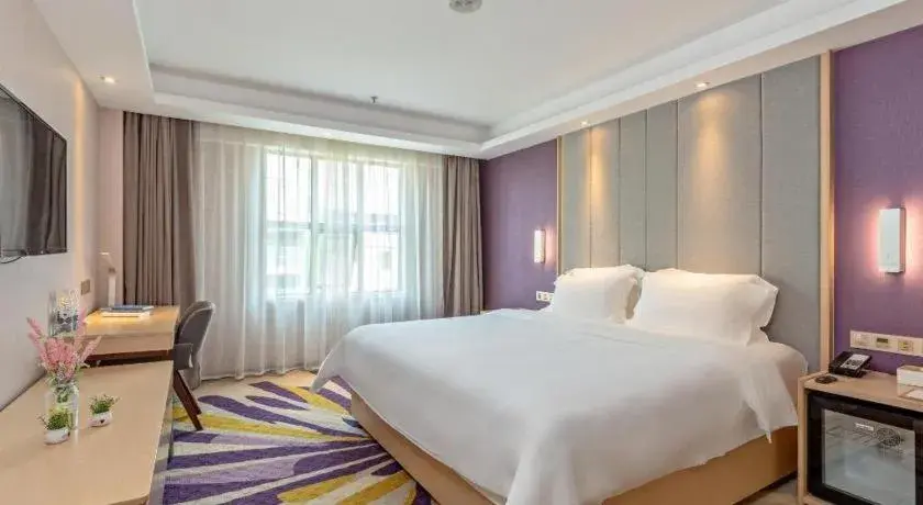 Bed in Lavande Hotels Guangzhou Baiyun Avenue North Metro Station Bed in Lavande Hotels Guangzhou Baiyun Avenue North Metro Station