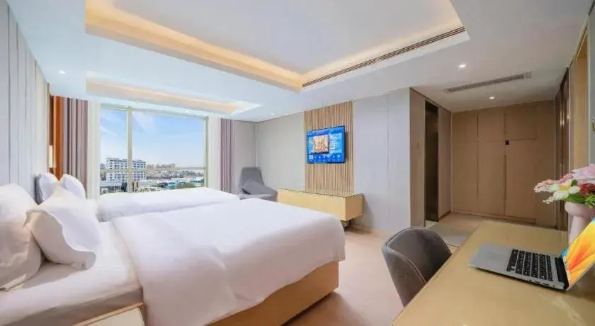 Bed in Lavande Hotels Guangzhou Baiyun Avenue North Metro Station Bed in Lavande Hotels Guangzhou Baiyun Avenue North Metro Station