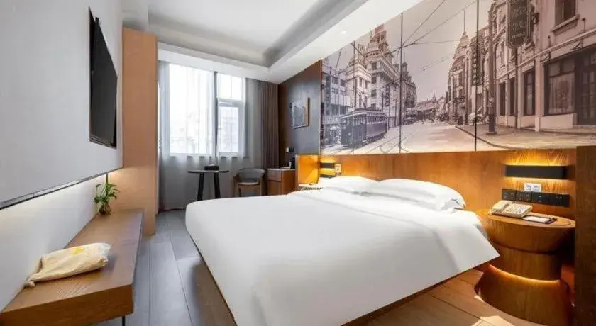 Bed in Jinjiang Metropolo Hotel Shanghai Hongqiao International Exhibition Center Branch Bed in Jinjiang Metropolo Hotel Shanghai Hongqiao International Exhibition Center Branch