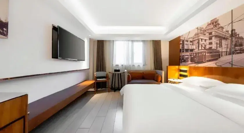 Bed in Jinjiang Metropolo Hotel Shanghai Hongqiao International Exhibition Center Branch Bed in Jinjiang Metropolo Hotel Shanghai Hongqiao International Exhibition Center Branch