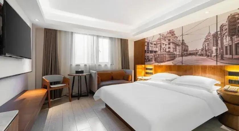 Bed in Jinjiang Metropolo Hotel Shanghai Hongqiao International Exhibition Center Branch Bed in Jinjiang Metropolo Hotel Shanghai Hongqiao International Exhibition Center Branch