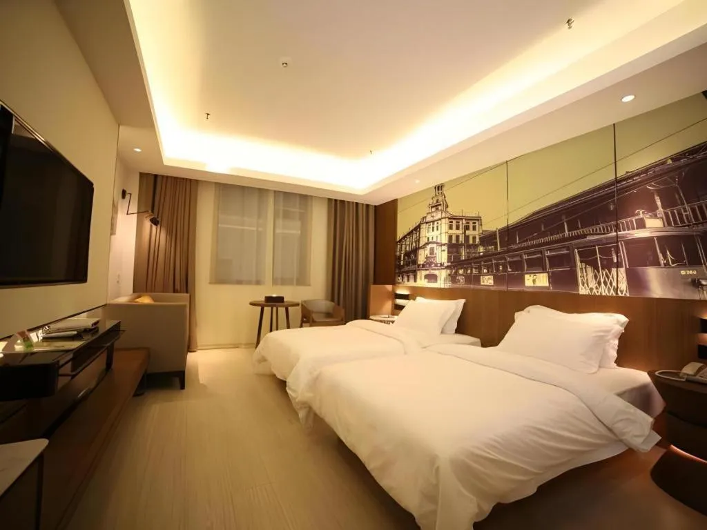 Bed in Jinjiang Metropolo Hotel Shanghai Hongqiao International Exhibition Center Branch