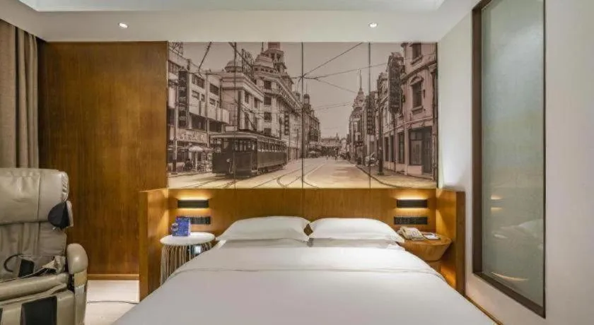 Bed in Jinjiang Metropolo Hotel Shanghai Hongqiao International Exhibition Center Branch