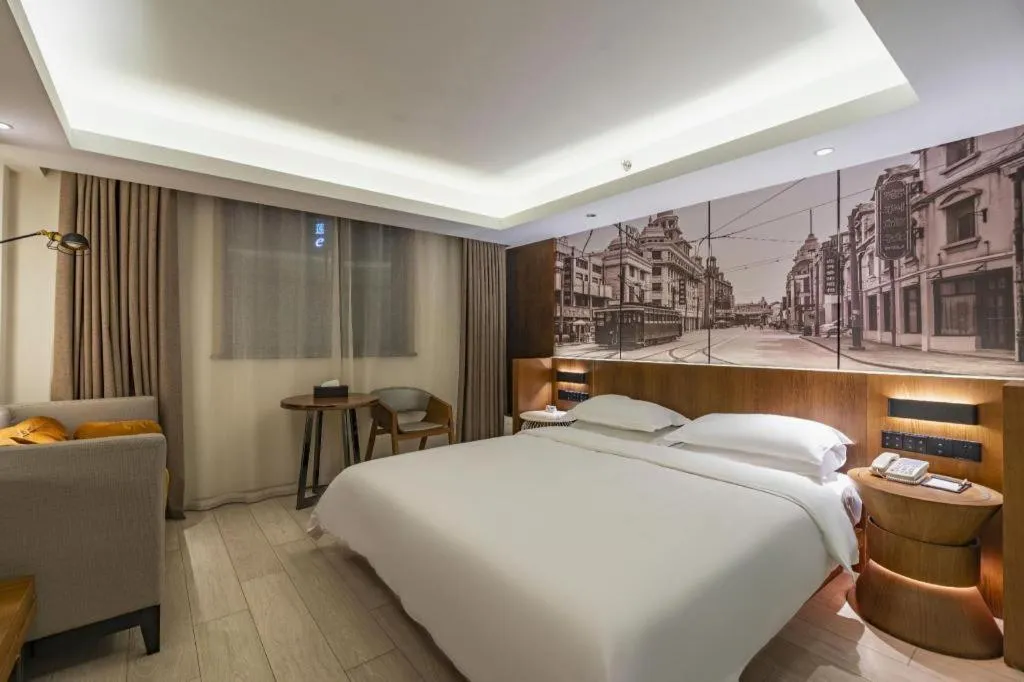 Bed in Jinjiang Metropolo Hotel Shanghai Hongqiao International Exhibition Center Branch