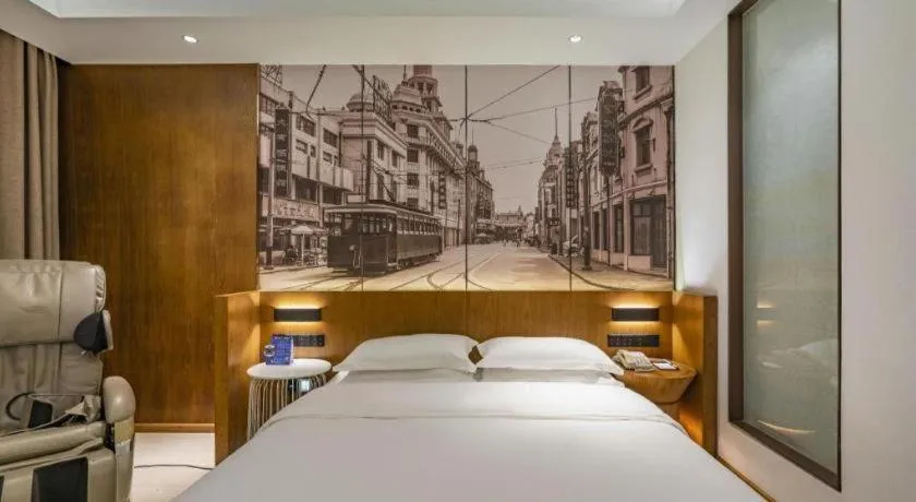 Bed in Jinjiang Metropolo Hotel Shanghai Hongqiao International Exhibition Center Branch