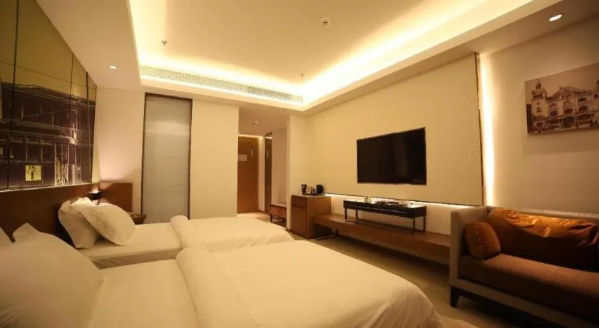 Bed in Jinjiang Metropolo Hotel Shanghai Hongqiao International Exhibition Center Branch