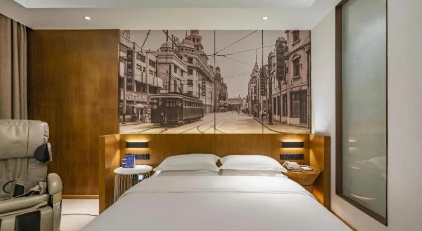 Bed in Jinjiang Metropolo Hotel Shanghai Hongqiao International Exhibition Center Branch