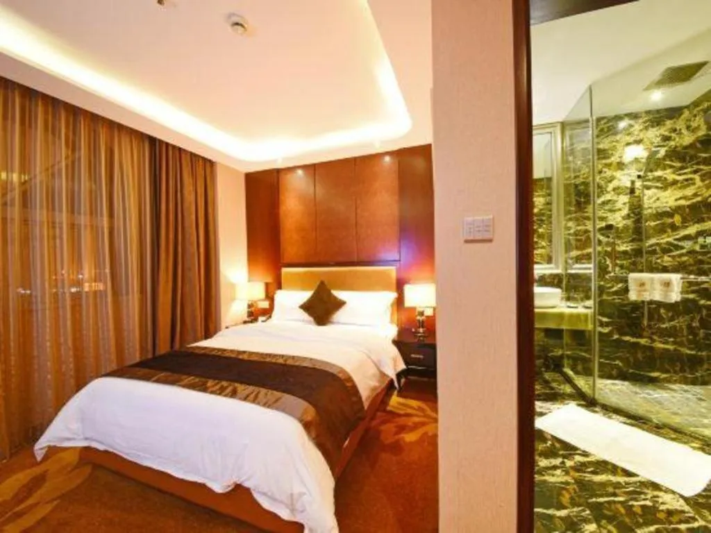 Bed in The Bmc Hotel