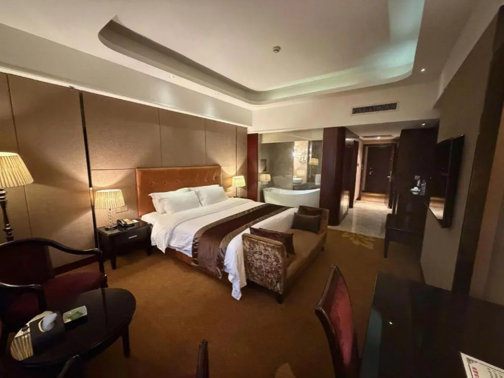 Bed in The Bmc Hotel