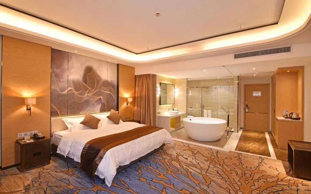 Bed in The Bmc Hotel