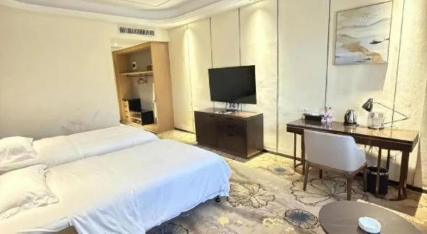 Bed in The Bmc Hotel